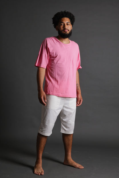 The model is wearing a pink tshirt from Sea Of Sound by Gavin Rossdale with a blank front 